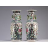 Pair of famille rose vases decorated with peacocks and furniture