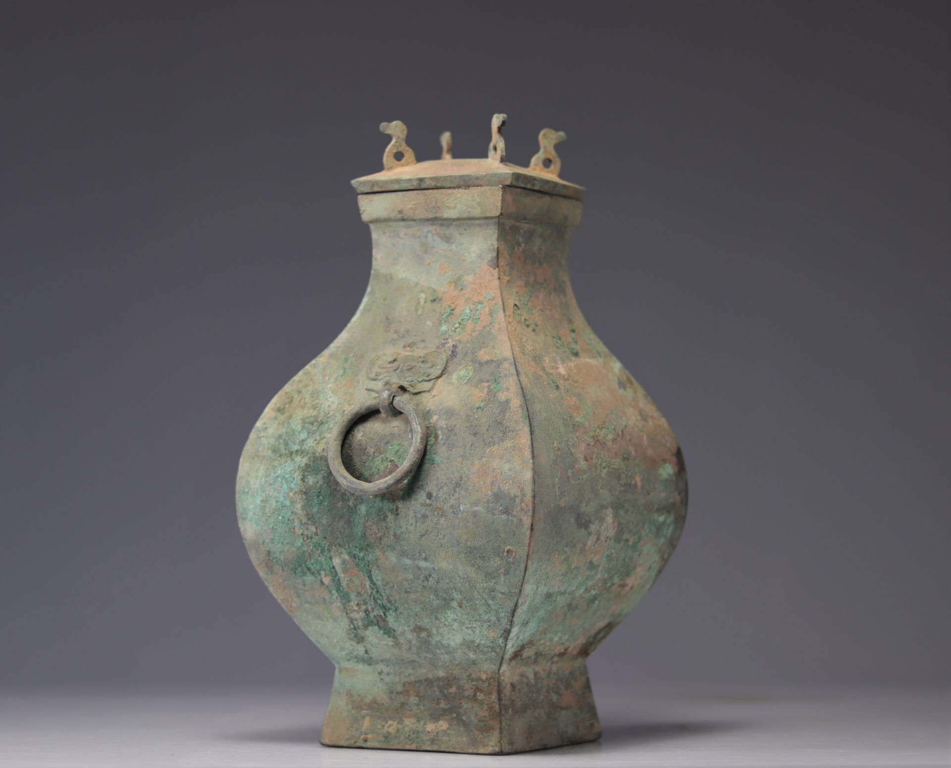 HAN DYNASTY (206 BC-220 AD) Bronze fanghu covered vase with excavation patina