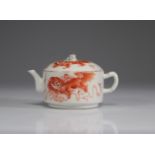 Chinese porcelain teapot decorated with "iron red" dogs