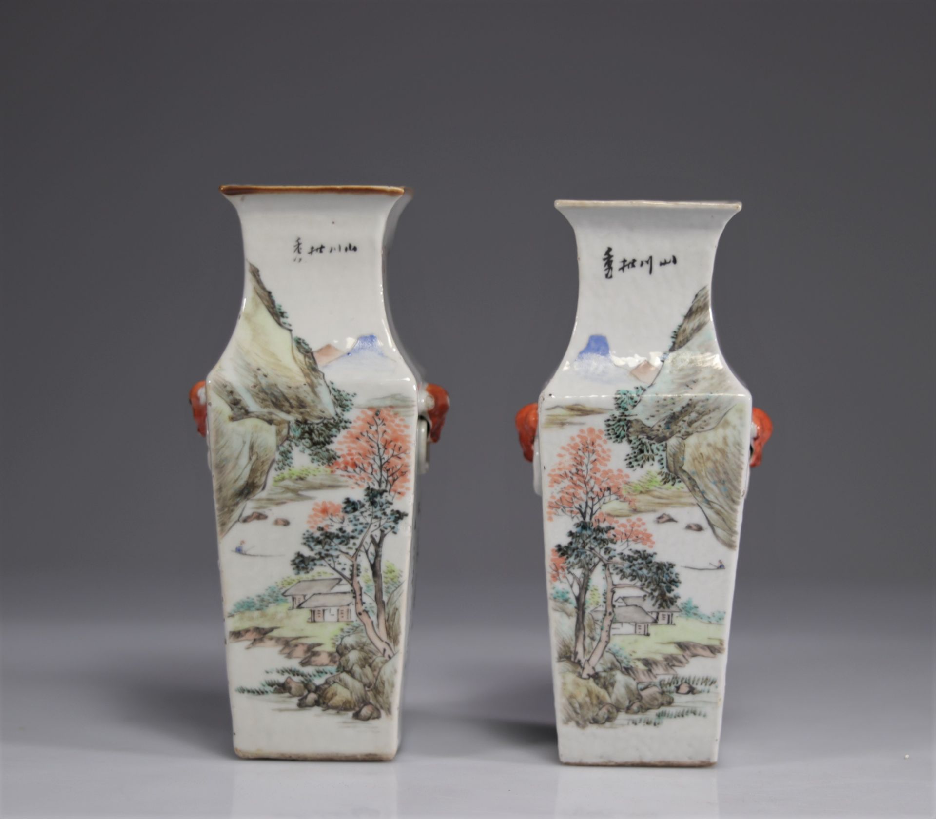 Pair of qianjiang cai young woman with fan porcelain vases