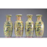 Vases (4) in Chinese famille rose porcelain decorated with dragons on a yellow background