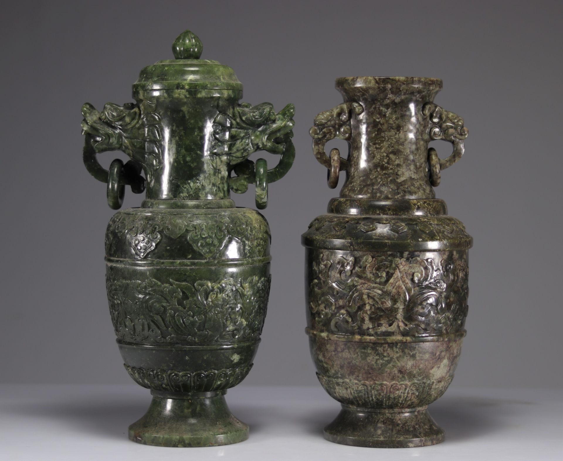 Lot of two jade vases decorated with dragon heads