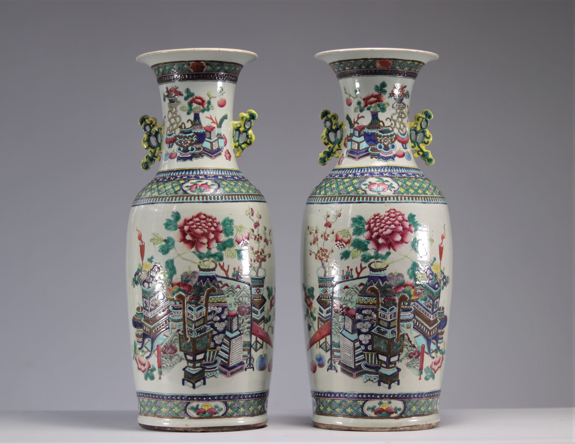Pair of famille rose vases decorated with peacocks and furniture - Image 2 of 3