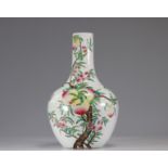 Porcelain vase decorated with peaches circa 1900