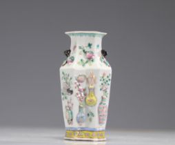 Rose family vase with relief decoration. China