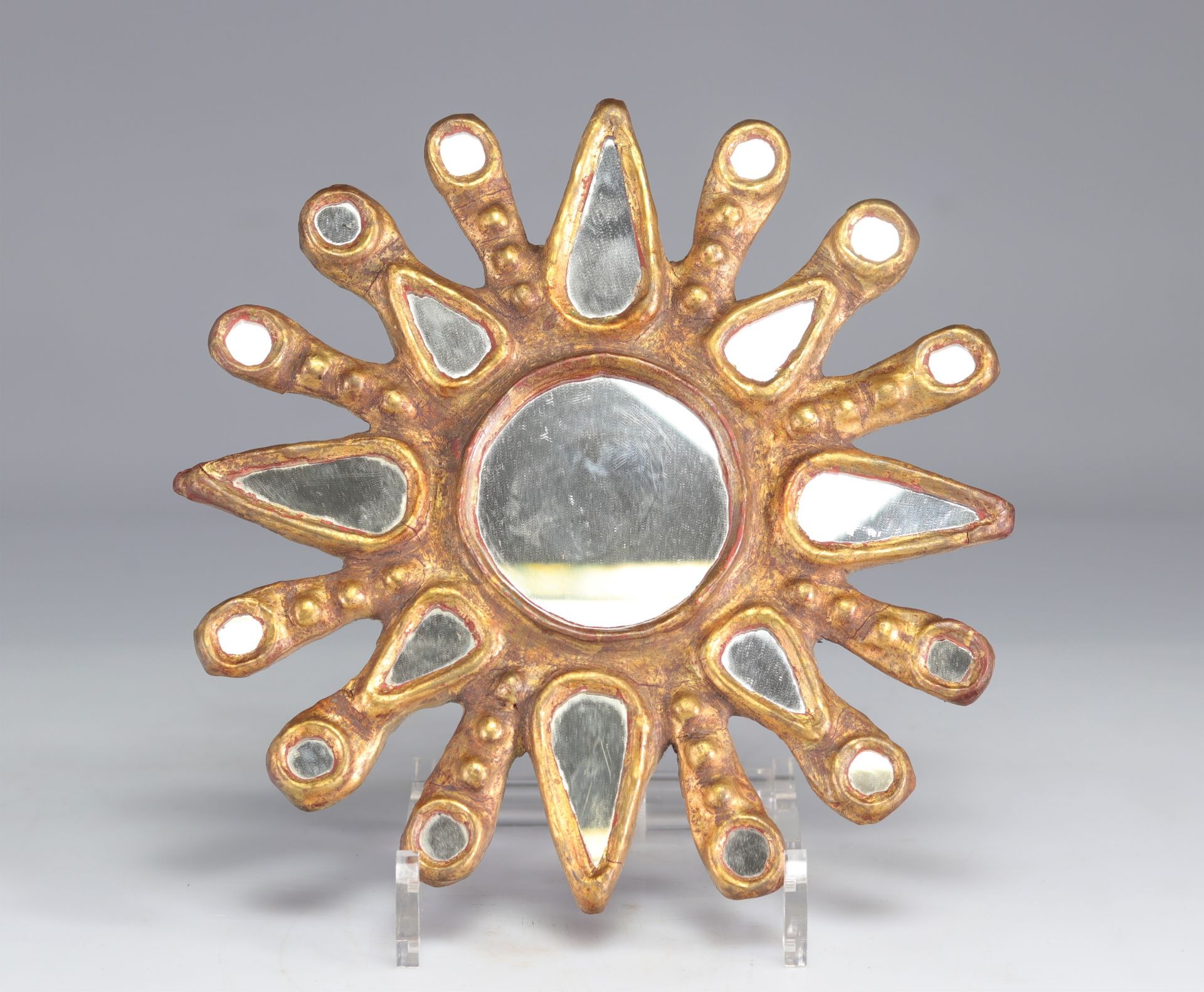 Sun mirror in gilded wood