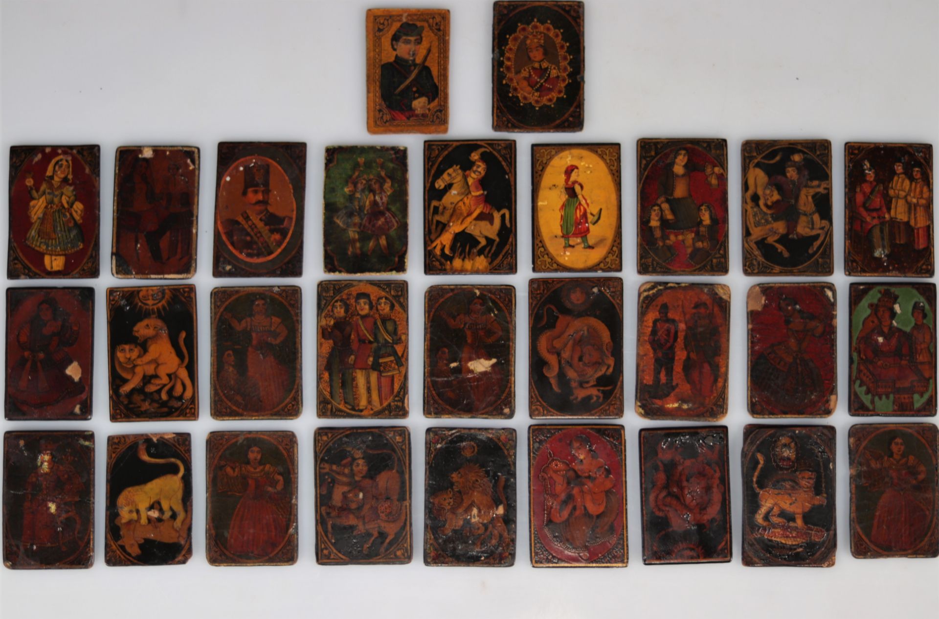 Lot of 29 19th century Kadjar playing cards in polychrome lacquer with various decorations