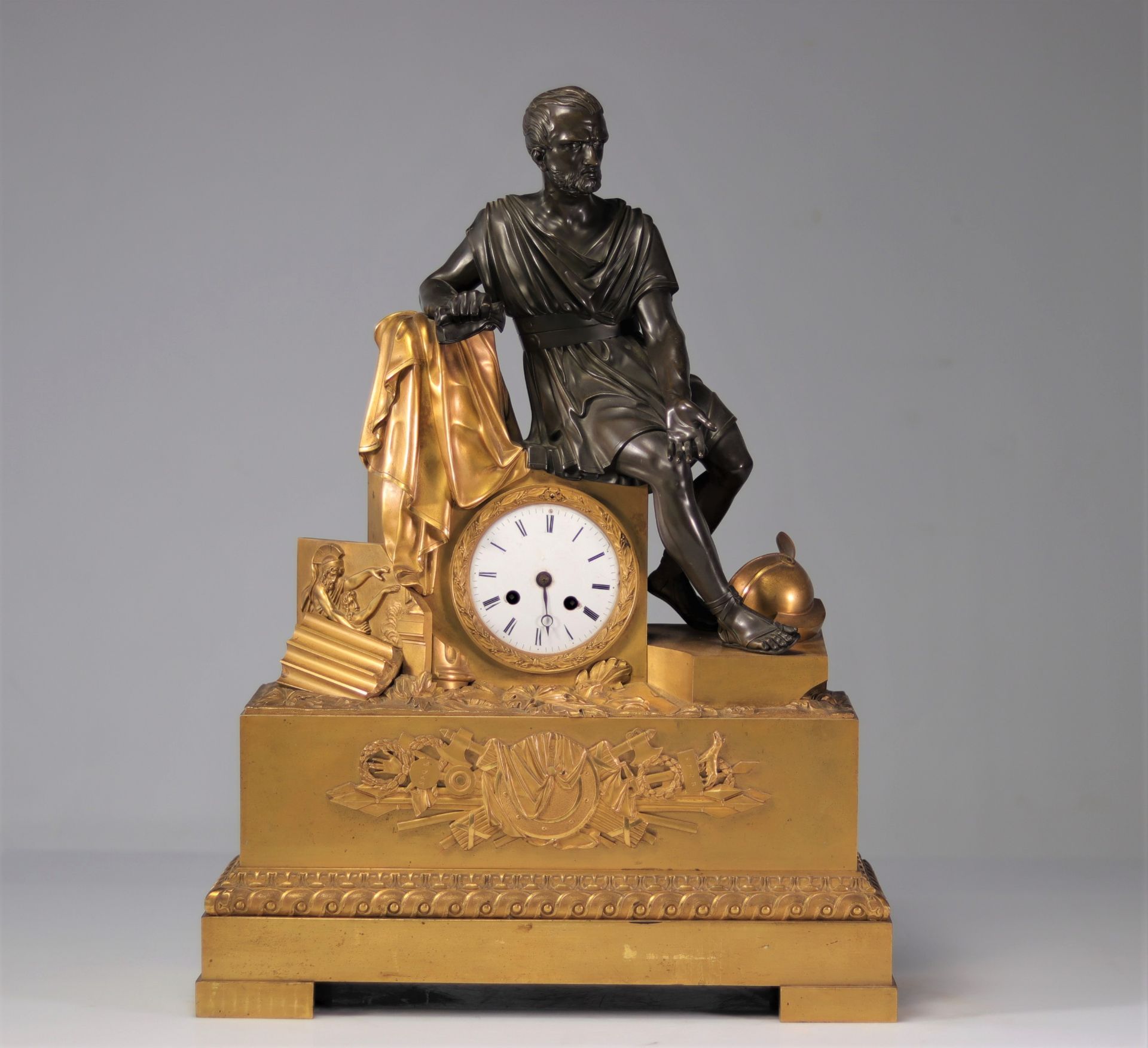 Imposing period Empire clock in bronze with two patinas