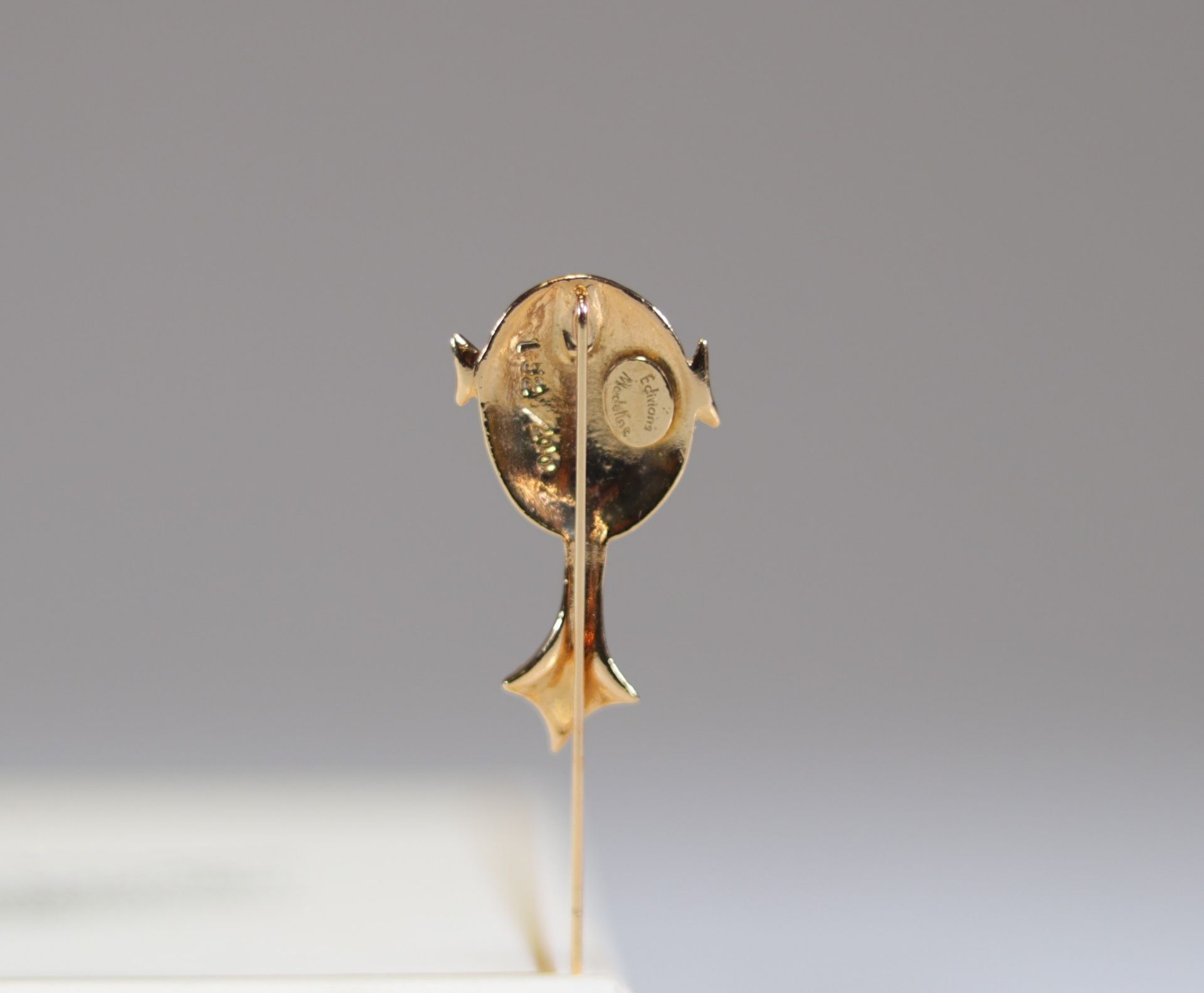 Jean Cocteau. "The Mischievous". Gilt bronze brooch. Signed "JC". Numbered /200. Sold with its certi - Image 3 of 4