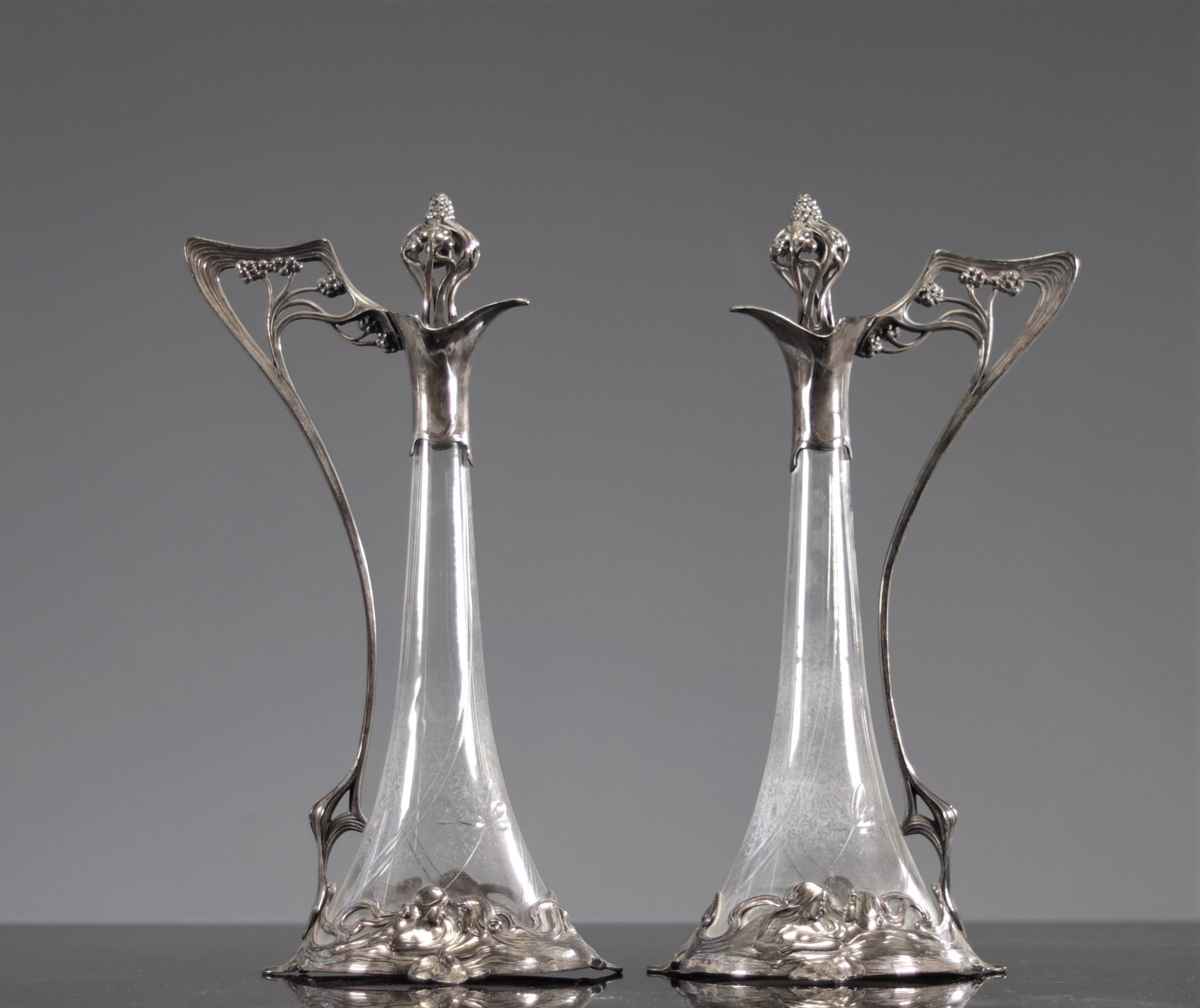 Pair of Art Nouveau carafes with floral decoration and young women 1900