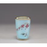 Daum Nancy acid-etched goblet decorated with flowers on a blue background