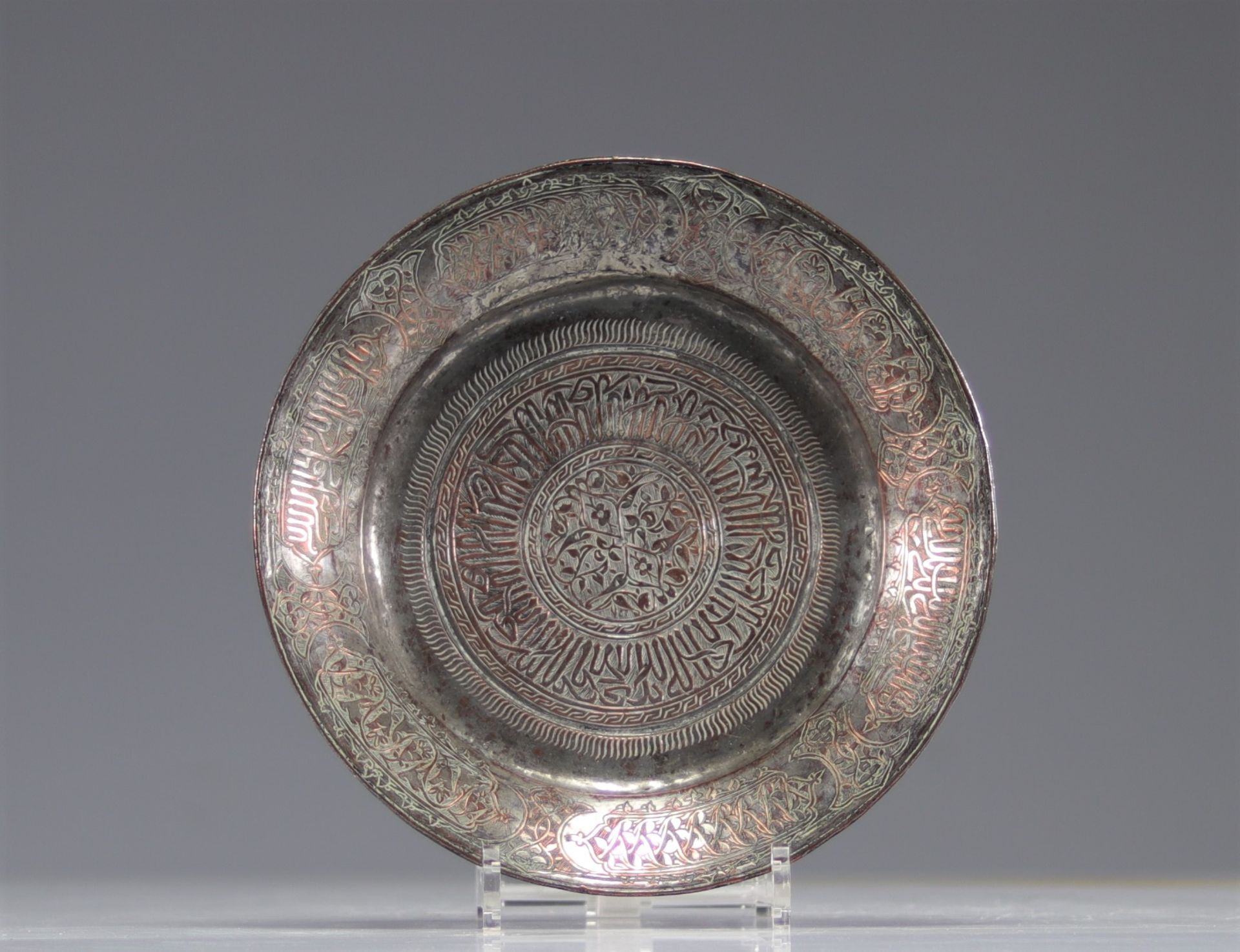 Persian or Ottoman dish decorated with writing, dated 1617 on the back in Gregorian script