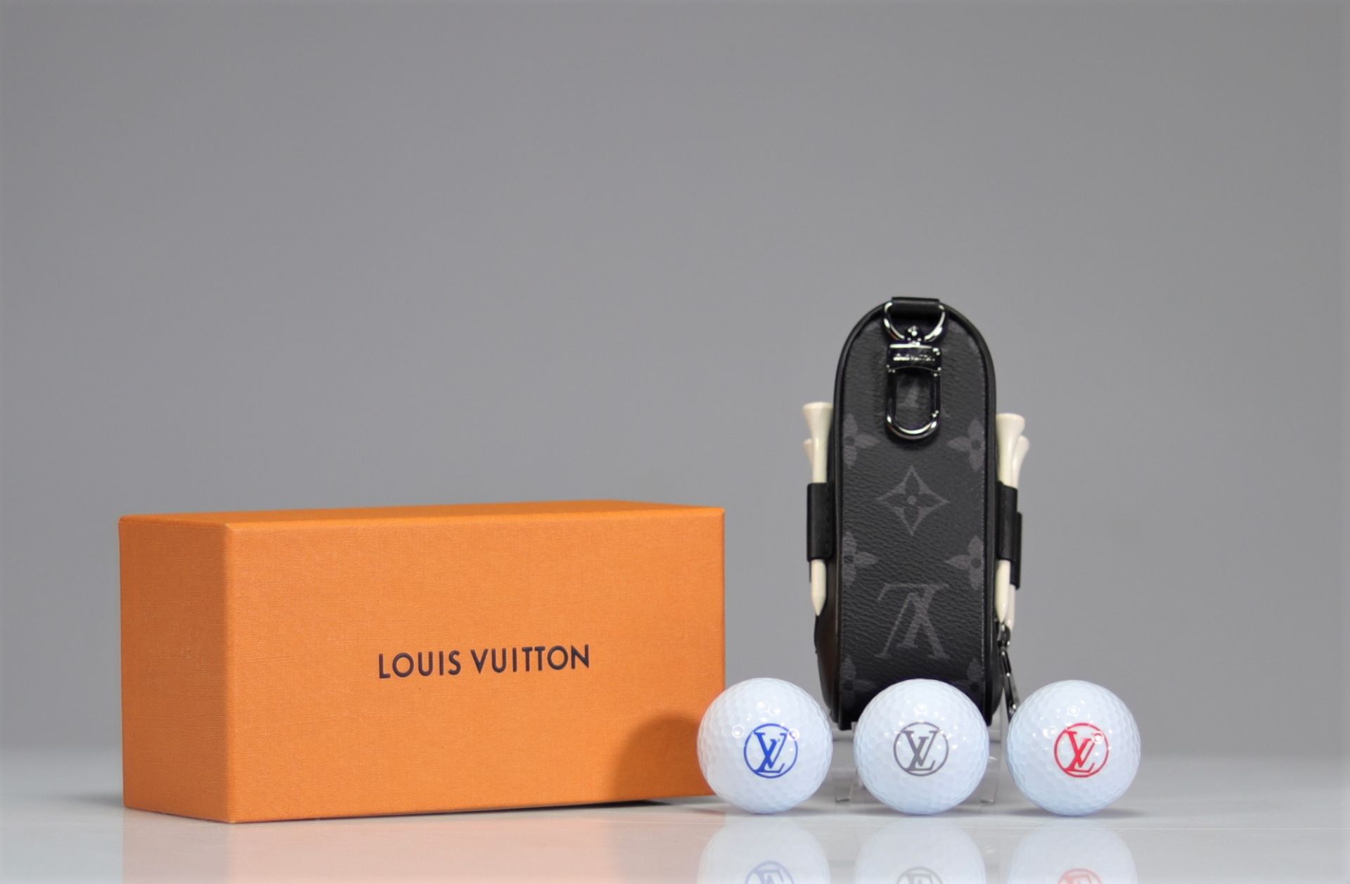 Louis Vuitton. "Andrews Golf Kit". Includes three golf balls, four tees and the Eclipse monogram kit