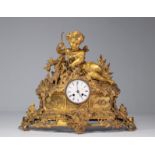Louis XV clock in gilded bronze surmounted by a young arche