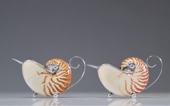 Pair of nautiluses mounted in jugs and silverware