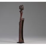 Musical instrument decorated with a head. Makonde - Mozambique