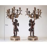 Pair of large bronze candelabras with two patina angels holding candleholders in the Louis XV style