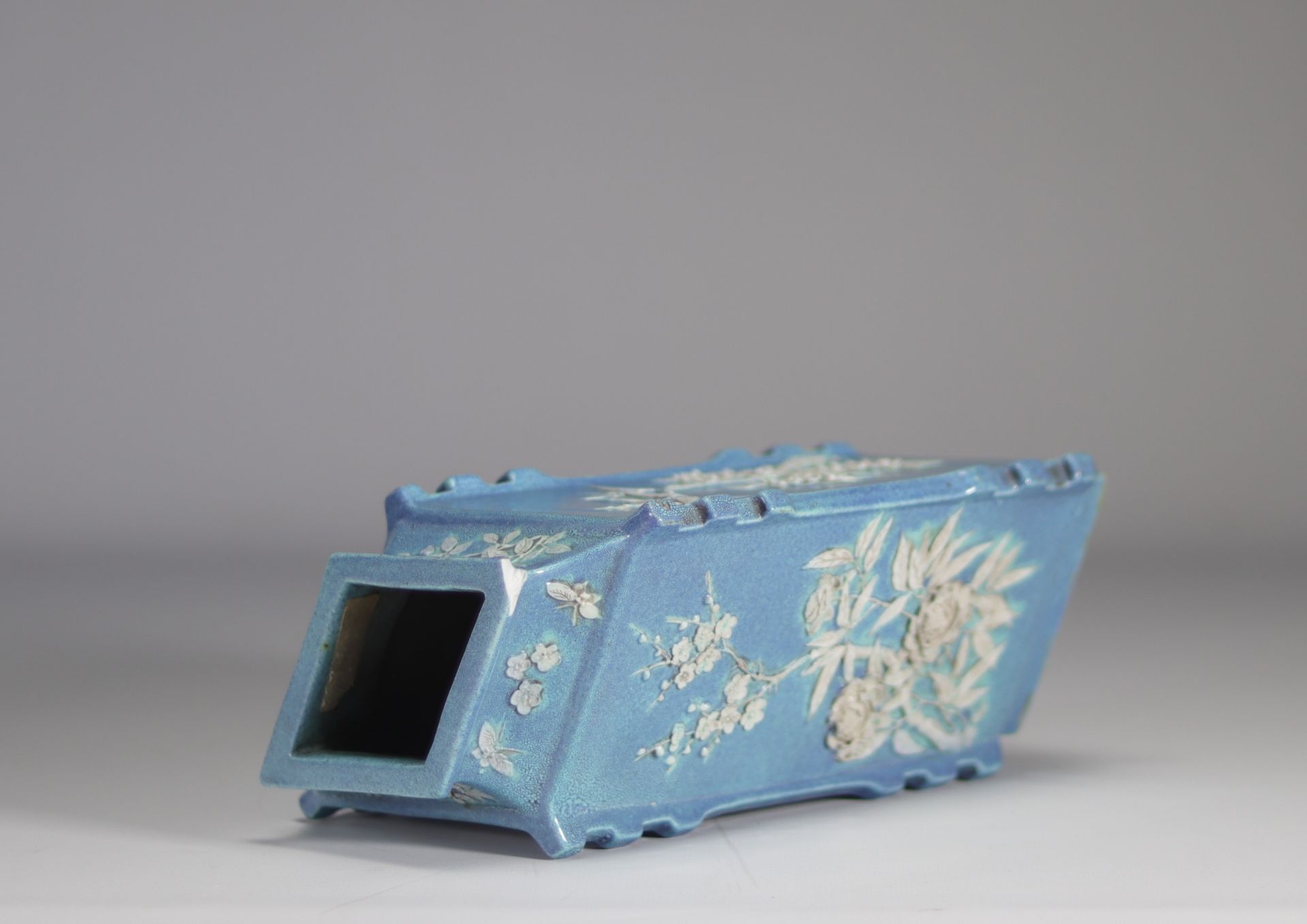 A Chinese porcelain vase decorated with flowers in relief on a light blue background from Qing perio - Image 4 of 5