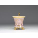 KPM porcelain cup with written "Vivat Clemens August" on a light pink background and surrounded by g