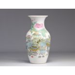 Famille Rose porcelain vase decorated with furniture objects