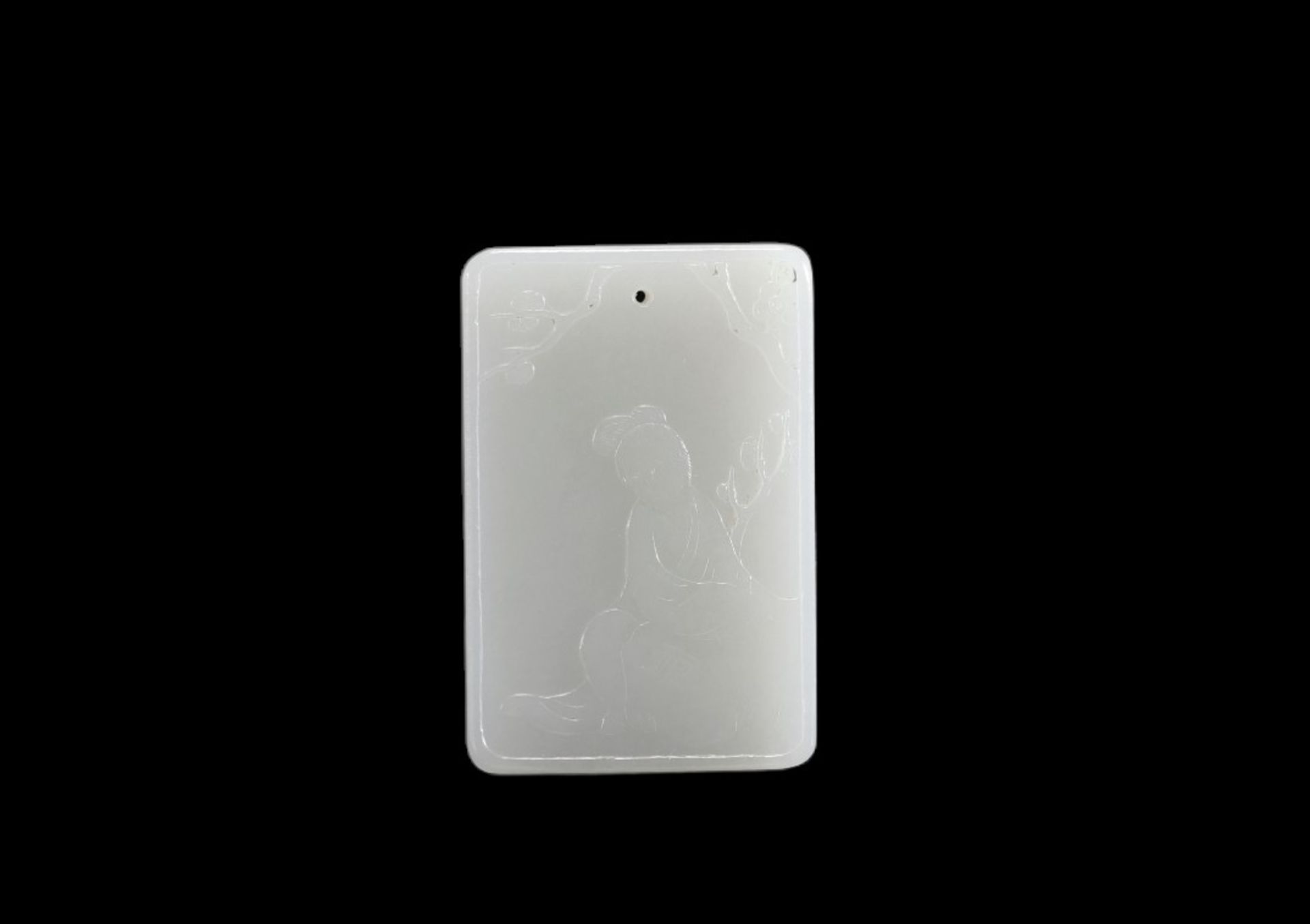 A white jade plaque decorated with young women and Chinese characters from the Qing period (æ¸…æœ)