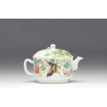 Famille rose porcelain teapot decorated with butterflies and flowers