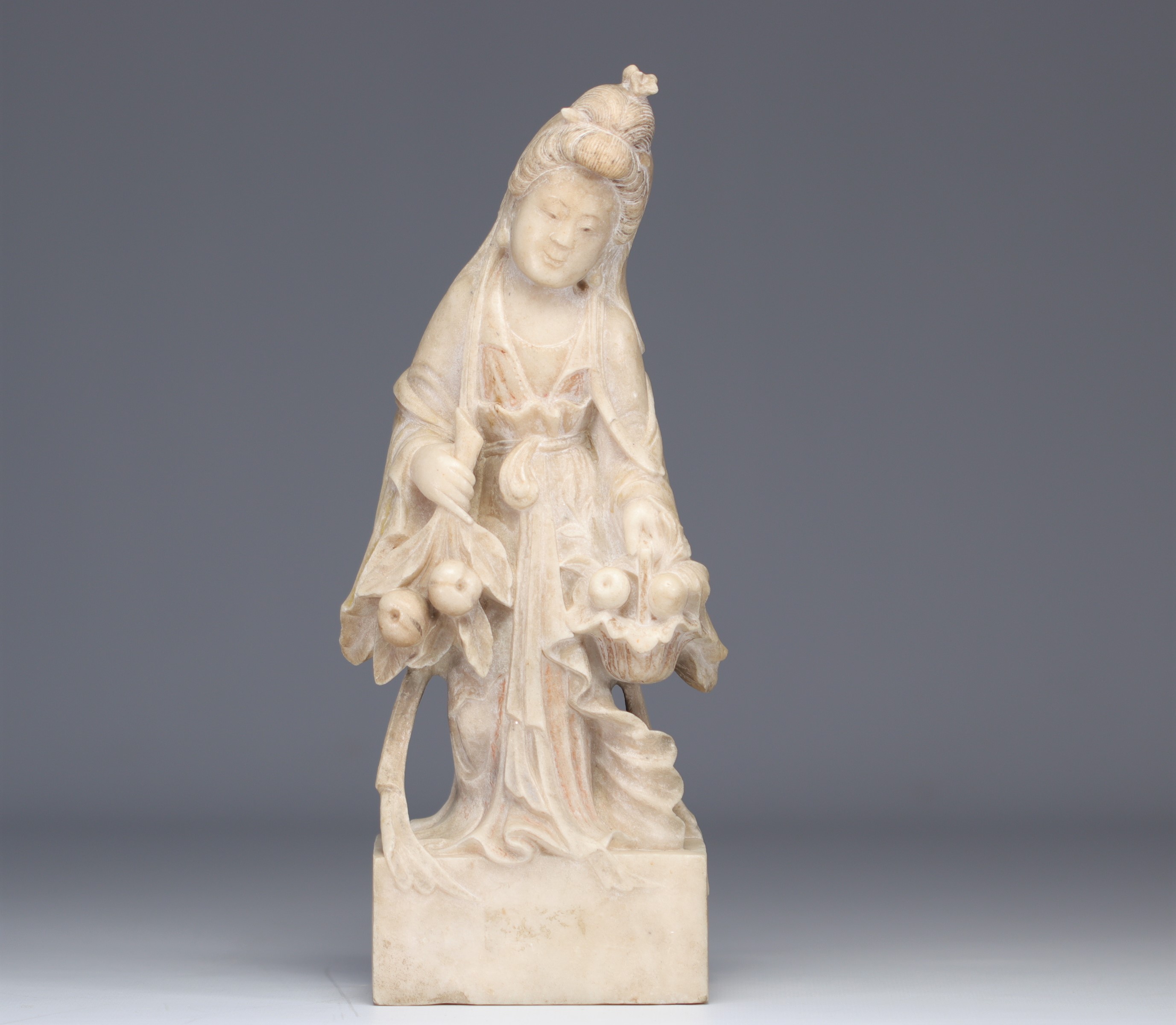 Marble sculpture of a young woman with fruit probably from the Ming period (æ˜Žæœ)