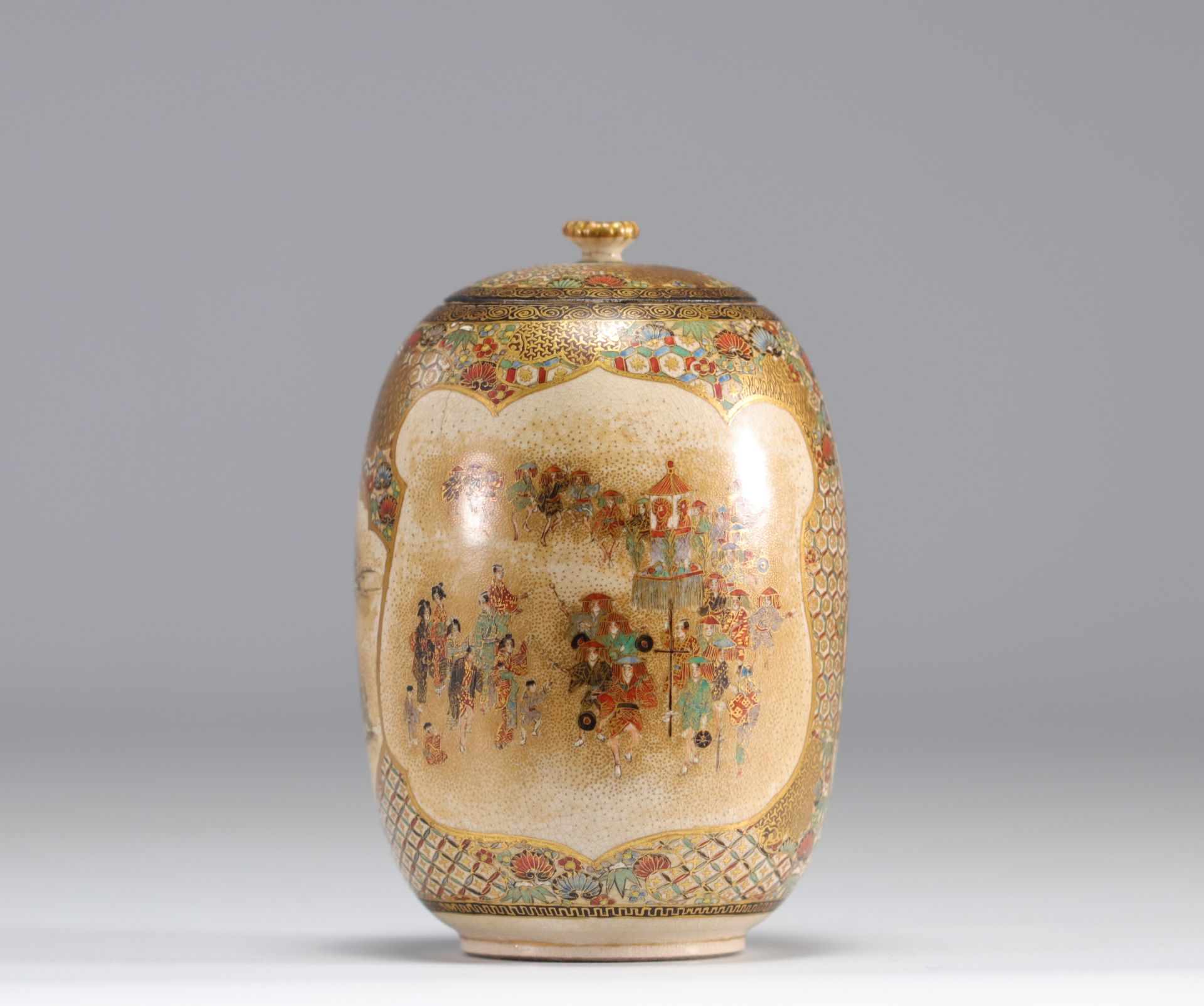 A beautiful enamel-decorated Satsuma covered vase with figures and flowers, circa late 19th century
