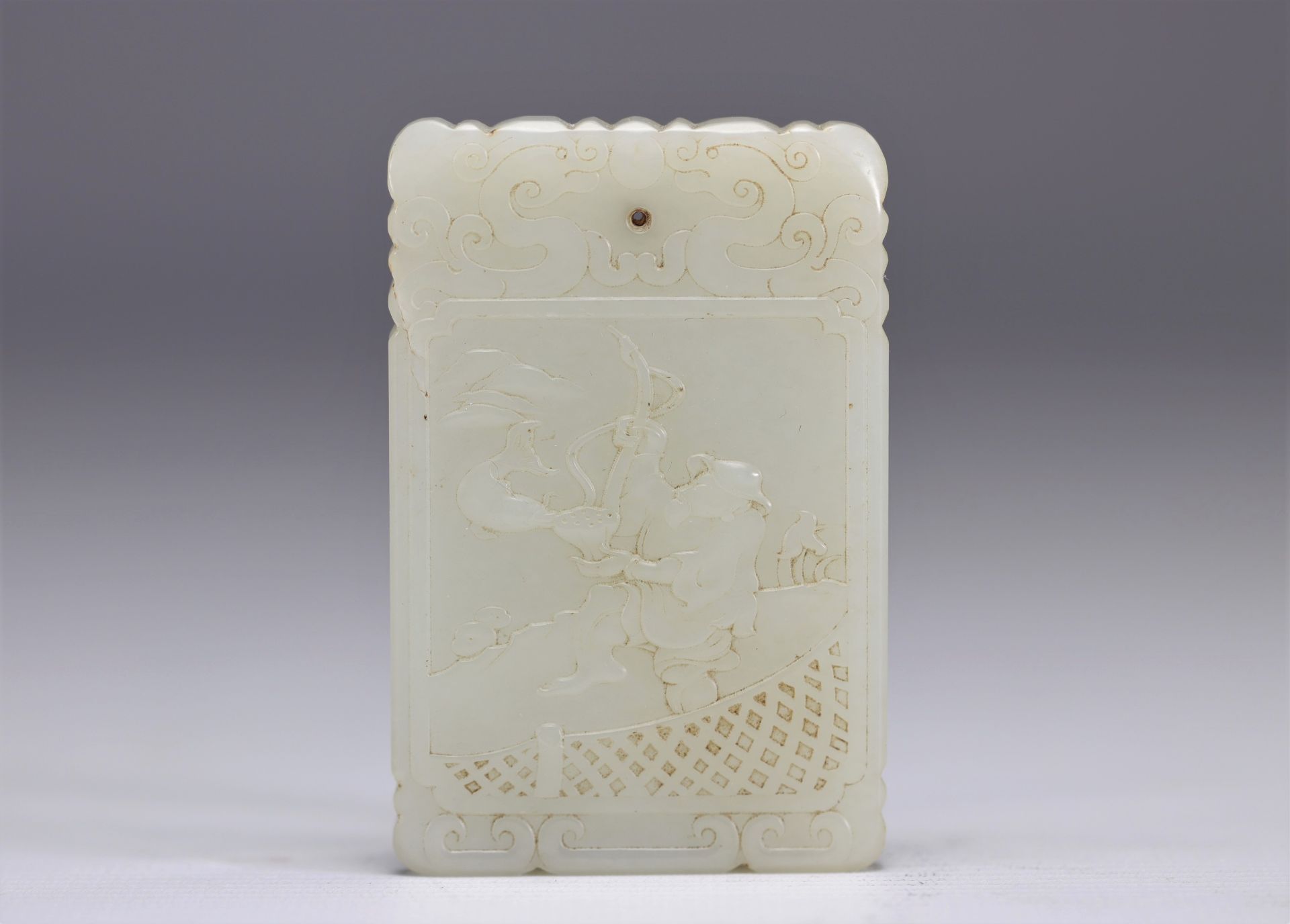 Rectangular white jade pendant carved in bas-relief on both sides with a fisherman on one side and c - Image 2 of 3