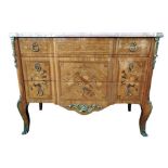 Attractive chest of drawers in marquetry decorated with bronze