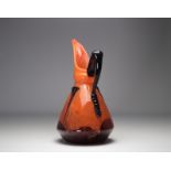 SCHNEIDER Proof glass pitcher on an orange background
