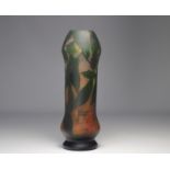 Daum Nancy multi-layered glass vase decorated with khaki on a green and orange mottled background