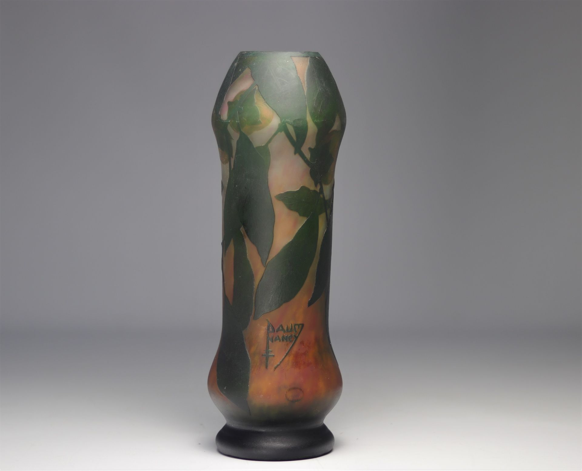 Daum Nancy multi-layered glass vase decorated with khaki on a green and orange mottled background