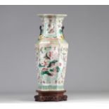 Porcelain vase of the pink family decorated with 19th century peacocks