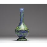 Vase in the shape of a bottle in glass paste