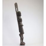 Wooden statue with crusty patina from the Dogon country, Mali