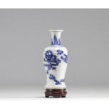 Small blue white porcelain vase decorated with imperial dragons