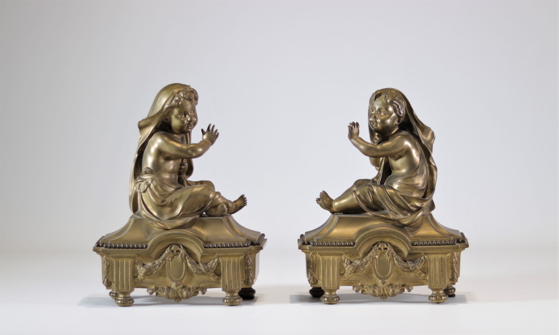Pair of gilt bronze andirons surmounted by children - Louis XVI