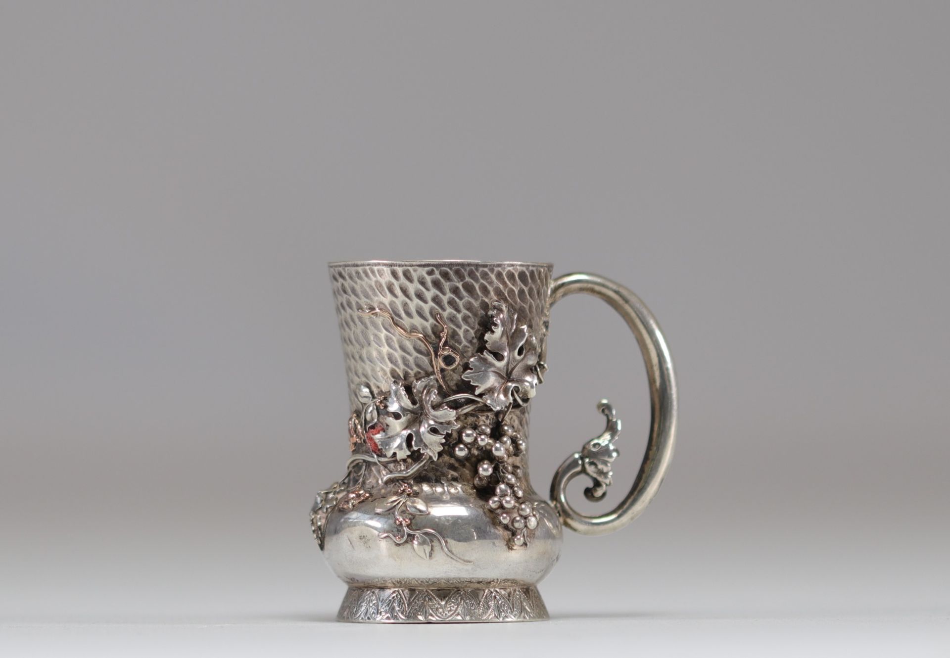 Sterling silver jug decorated with grapes