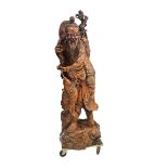 Imposing life-size Asian wooden sculpture "the fisherman"