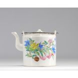 Porcelain teapot of the rose family decorated with peaches and flowers