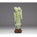 Green jade sculpture of a young woman with a fan 20th century