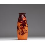 Degue multi-layered vase decorated with berries on an orange background