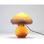 Marbled glass mushroom lamp on an orange background signed Vianne
