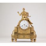 Beautiful gilt bronze clock decorated with a naked young woman and an Empire style angel