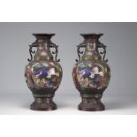 Pair of enclosed vases from 19th century Asia