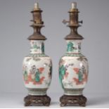 Pair of famille verte porcelain vases decorated with characters