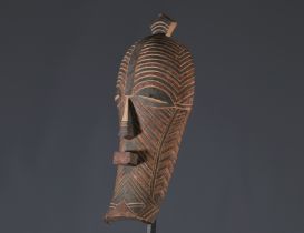 Black and red polychrome kifwebe hut mask circa 1930, with typical Luba Songye features