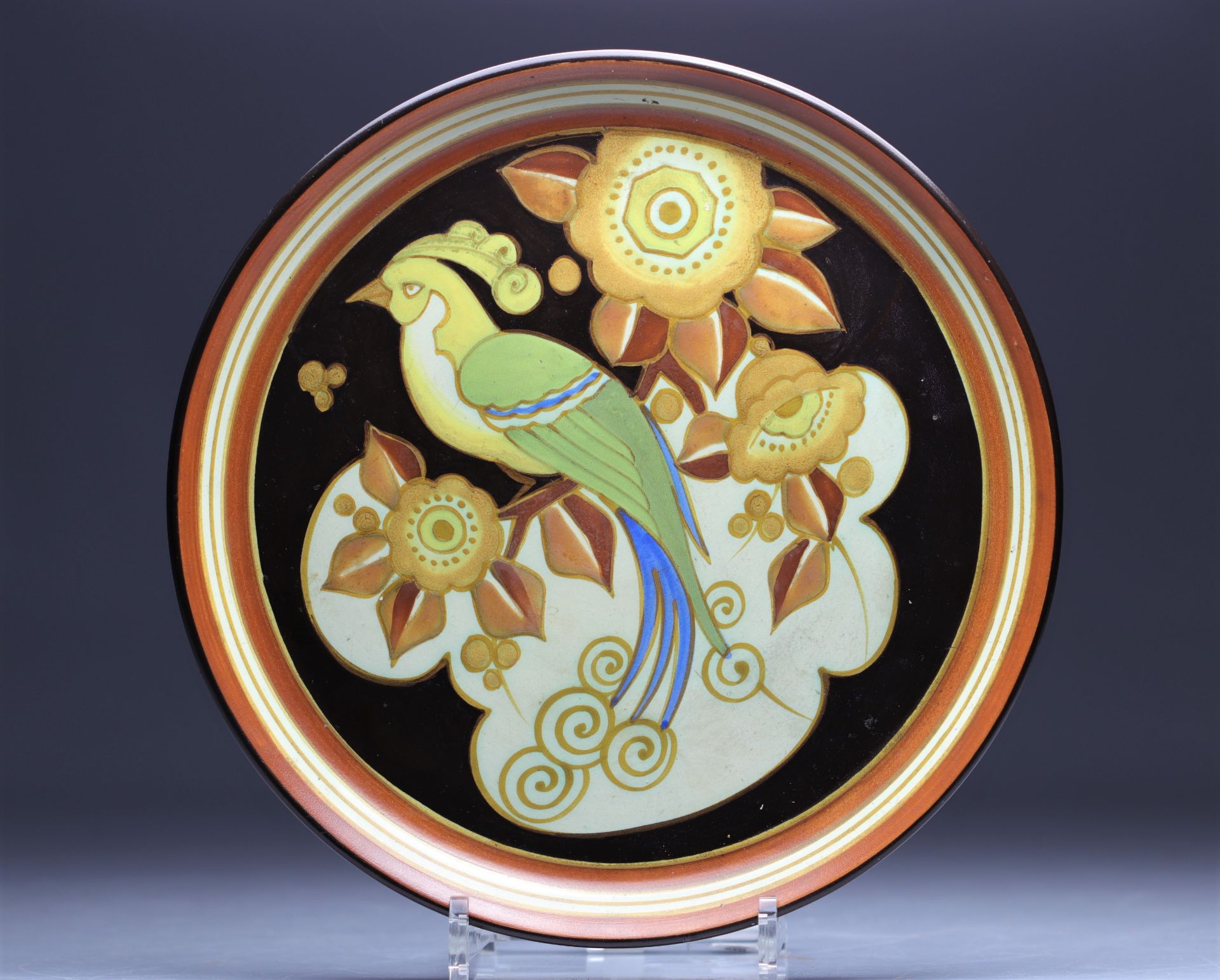 Charles CATTEAU (1880-1966). Boch Keramis dish decorated with lyre birds in mat finish.