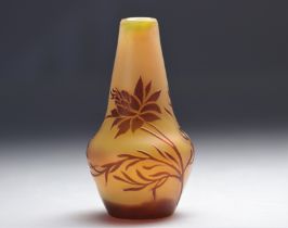 Devez acid-etched vase decorated with red flowers on an orange background